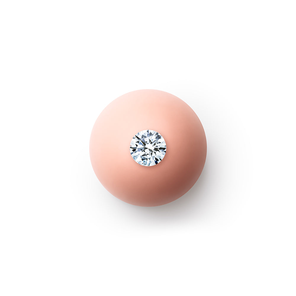 0.701ct Godavari Diamond - set within a coral resin globe